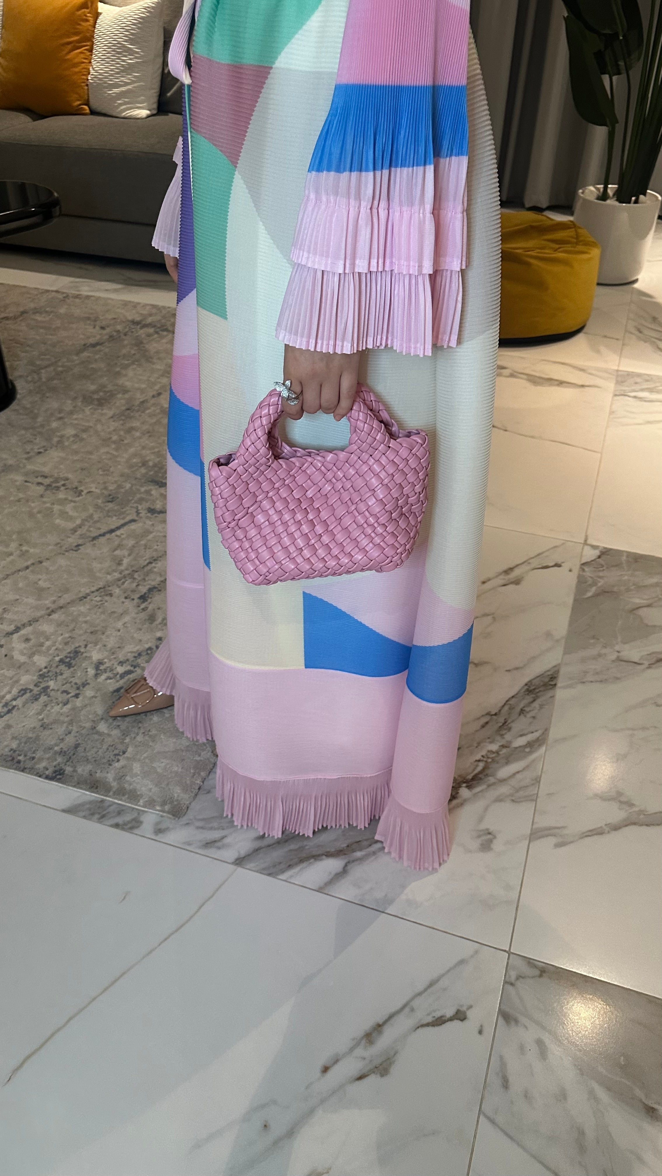 Clear UAE pink woven shoulder bag detail view
