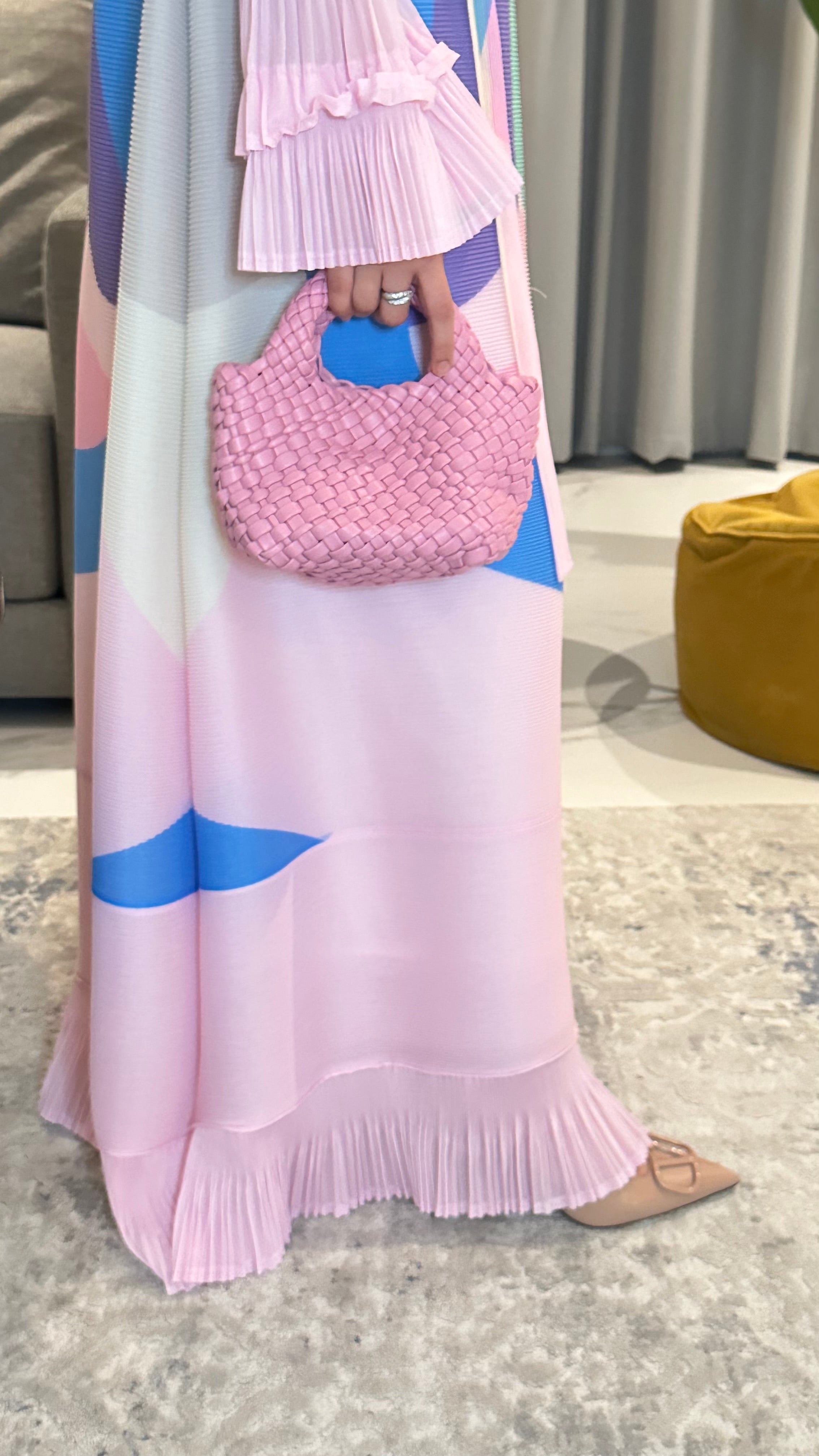 Clear UAE pink woven shoulder bag detail view

