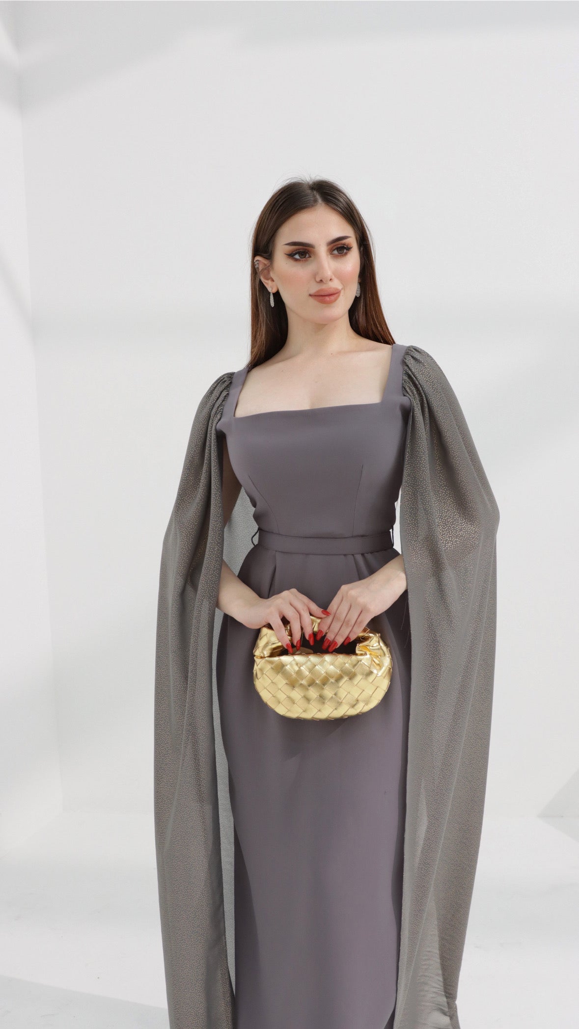 Gold micro handle bag by Clear UAE