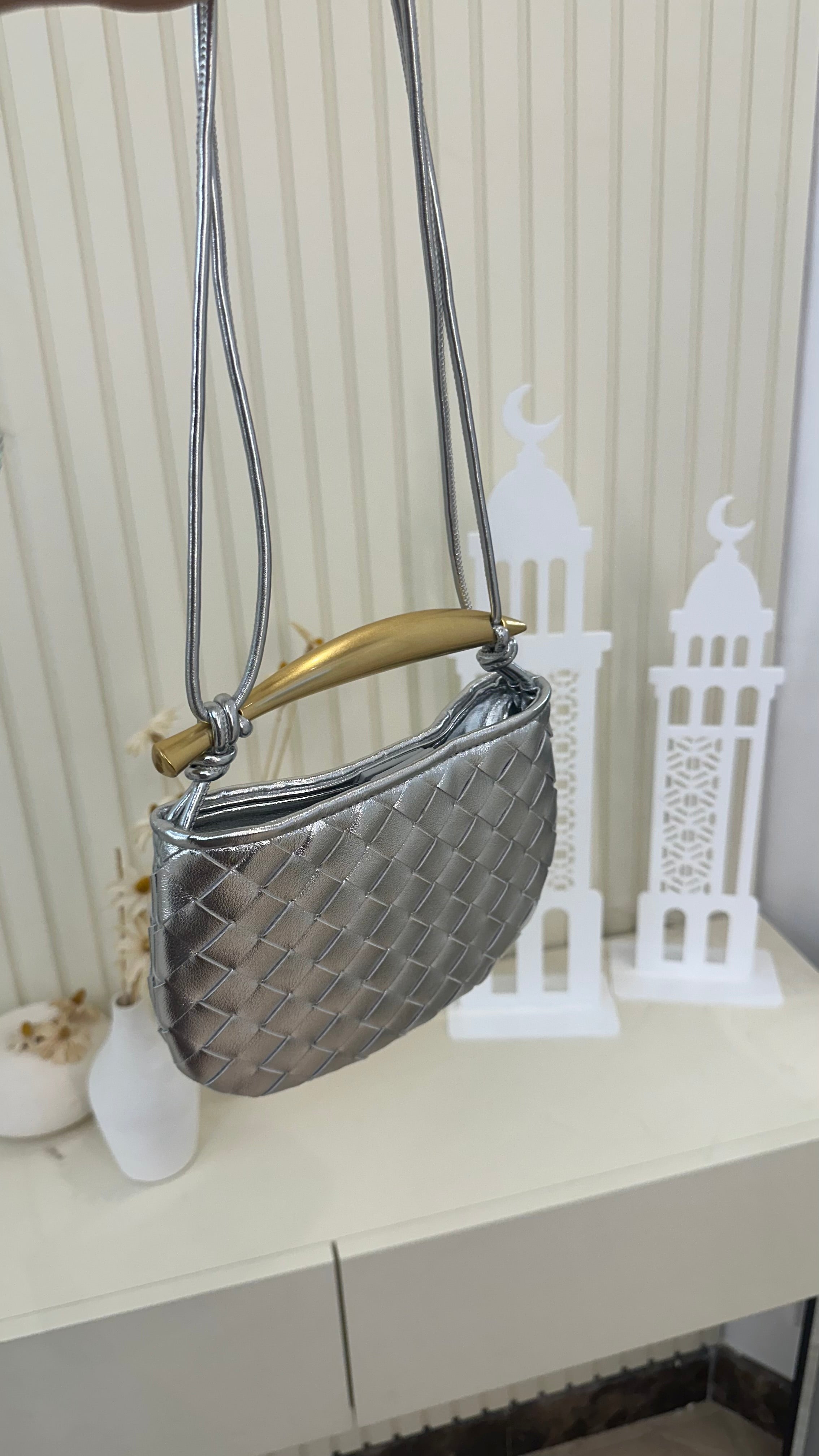 Clear UAE silver Bottega sardine mini bag detail view
