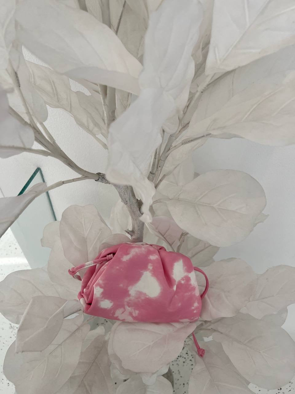 Clear UAE mix pink Bottega pouch bag detail view
