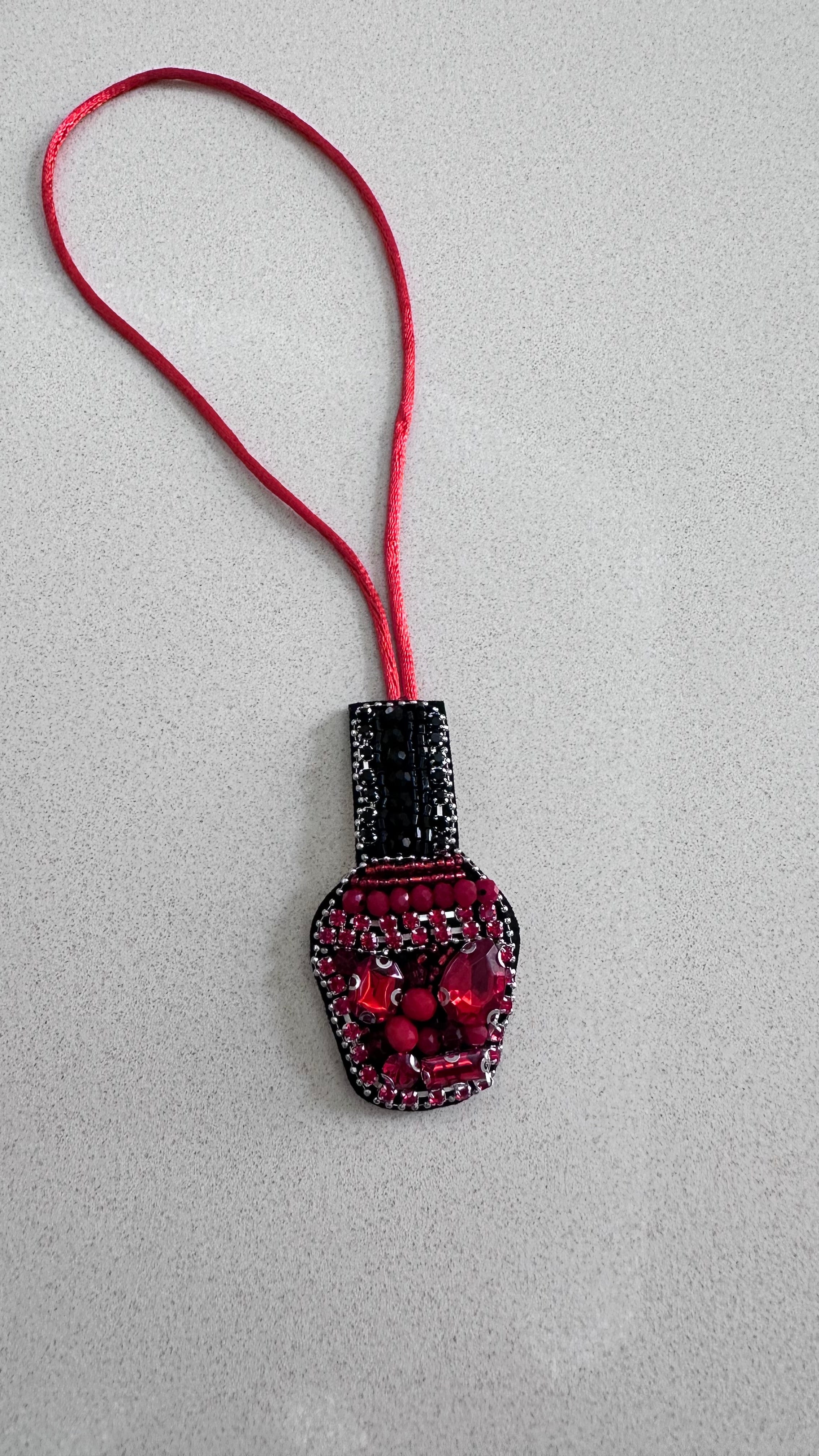 Nail polish charm