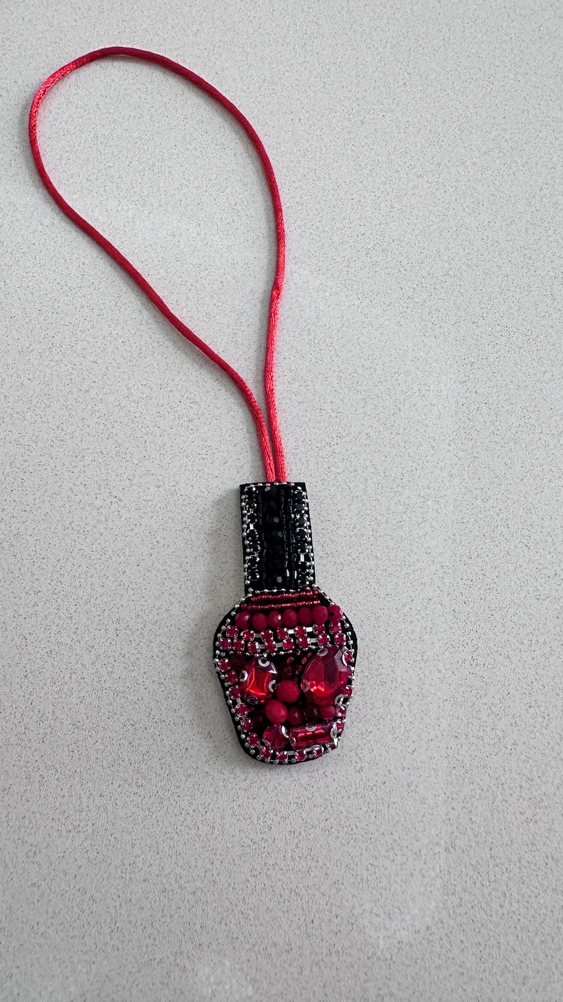 Nail polish charm