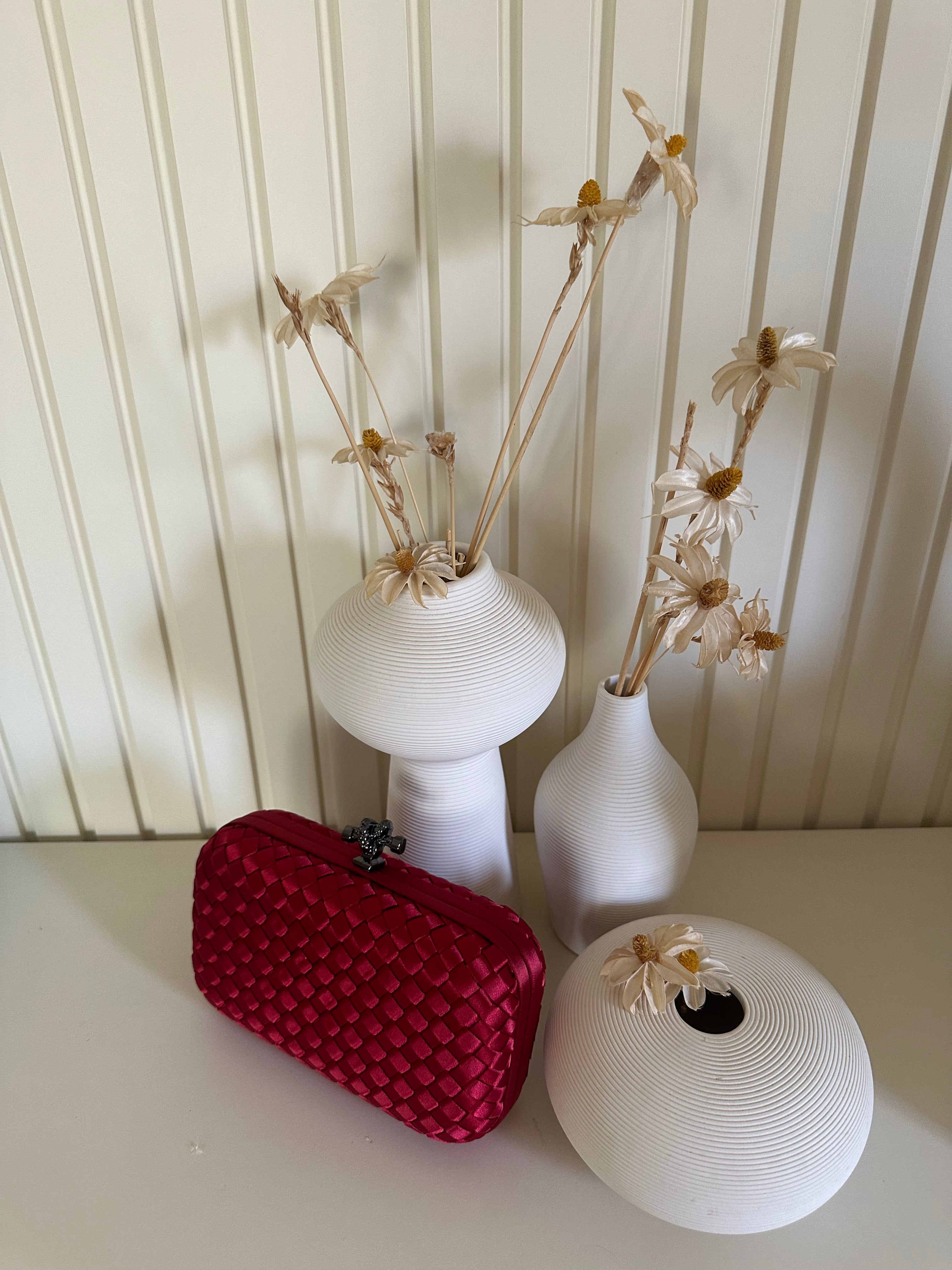 Clear UAE red mini clutch bag front view
