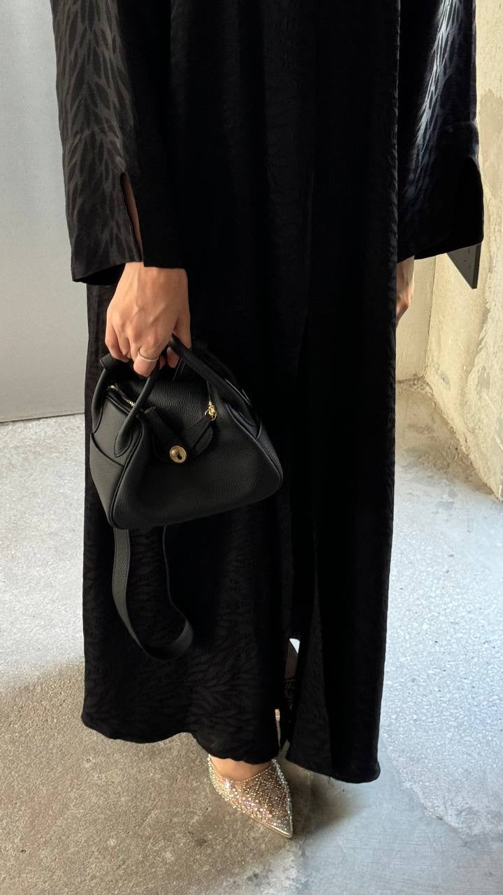 Clear UAE black Lindy shoulder bag detail view
