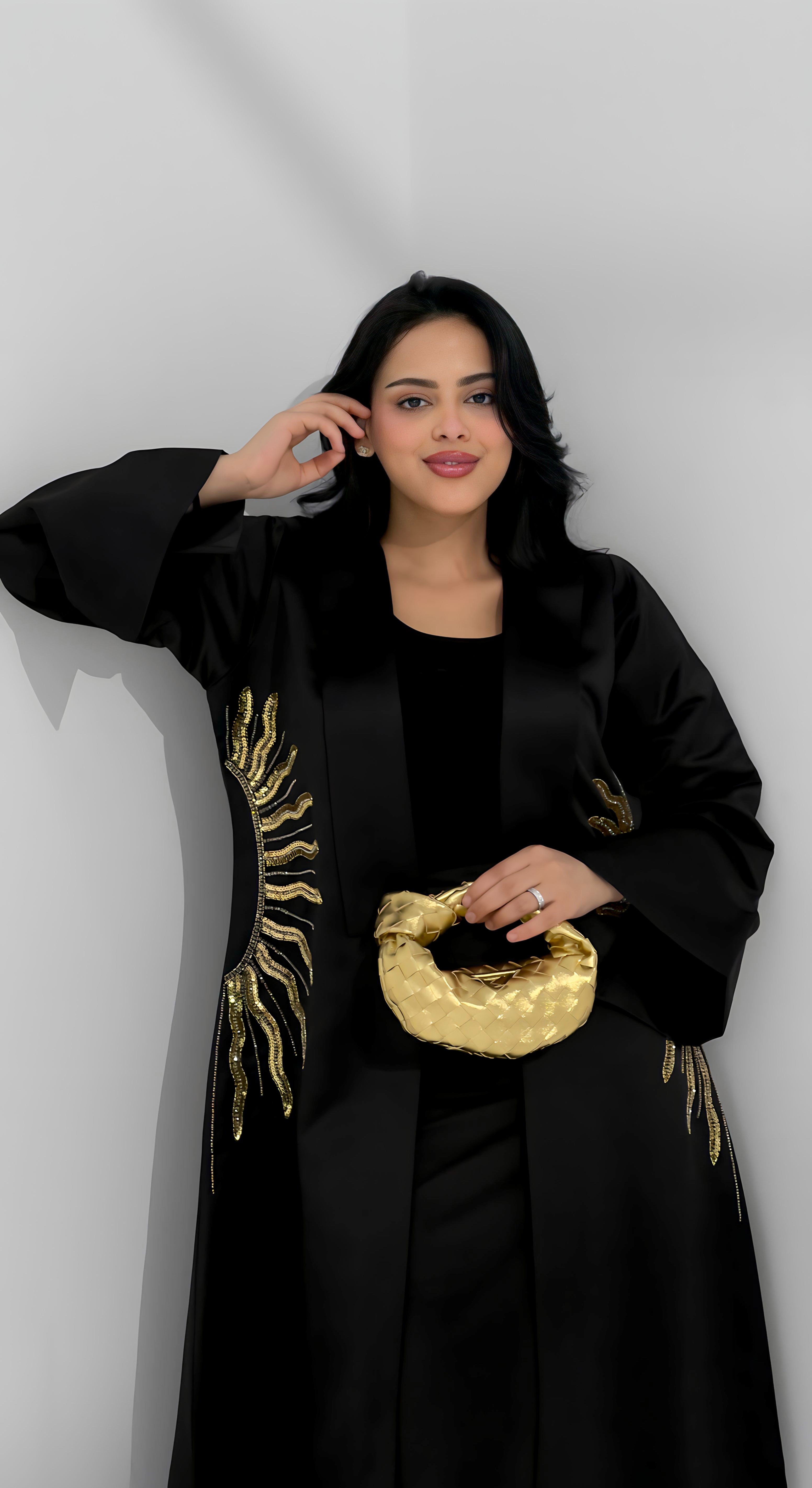 Gold micro handle bag by Clear UAE