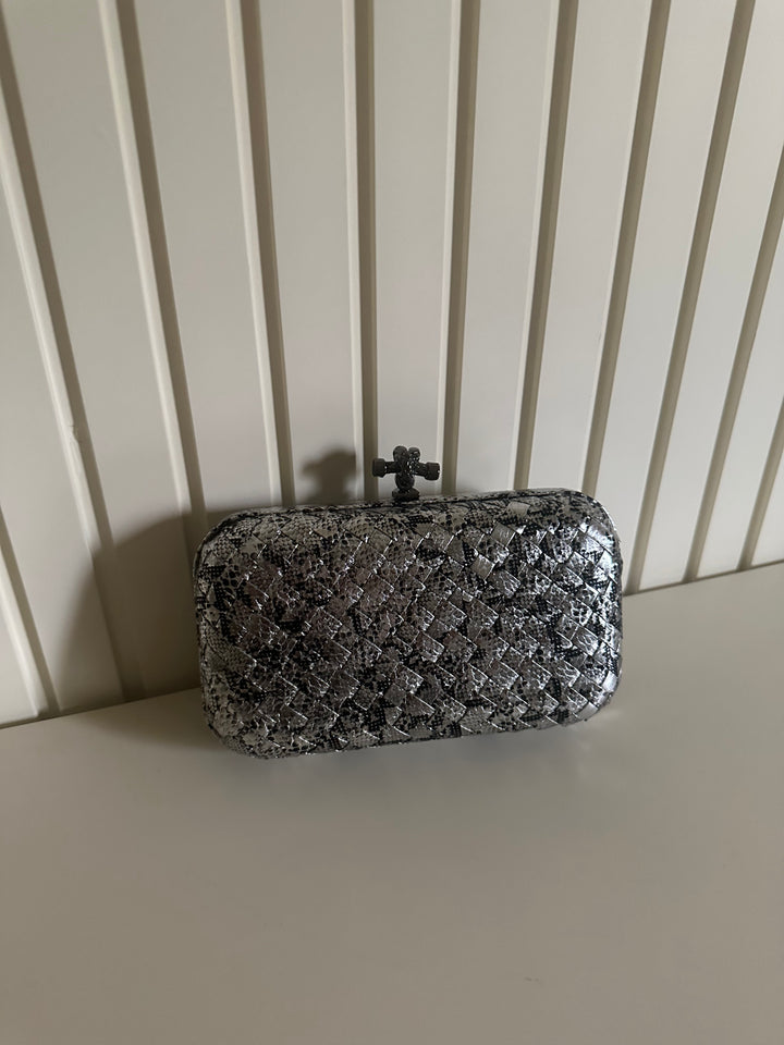 Limited  silver clutch