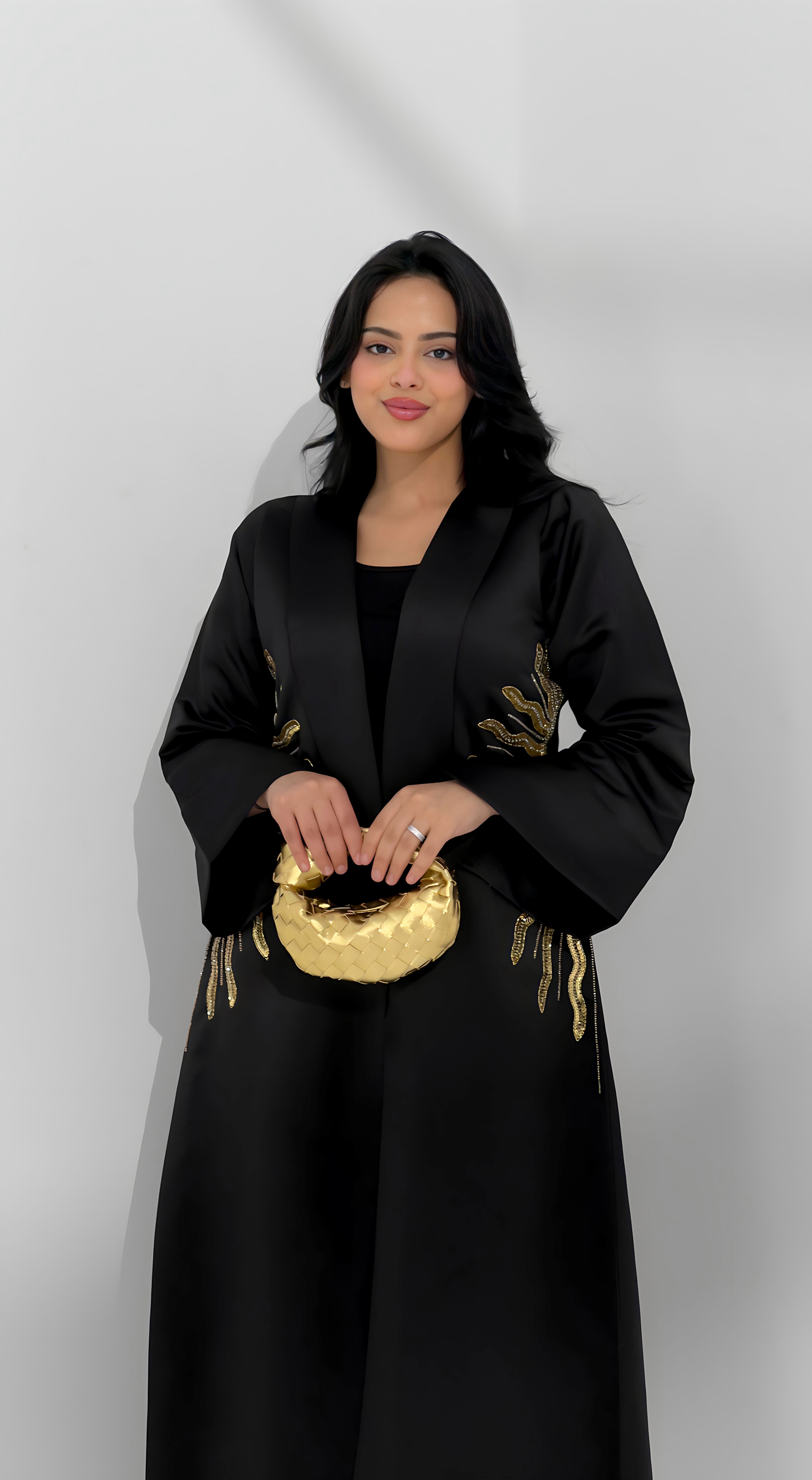 Gold micro handle bag by Clear UAE