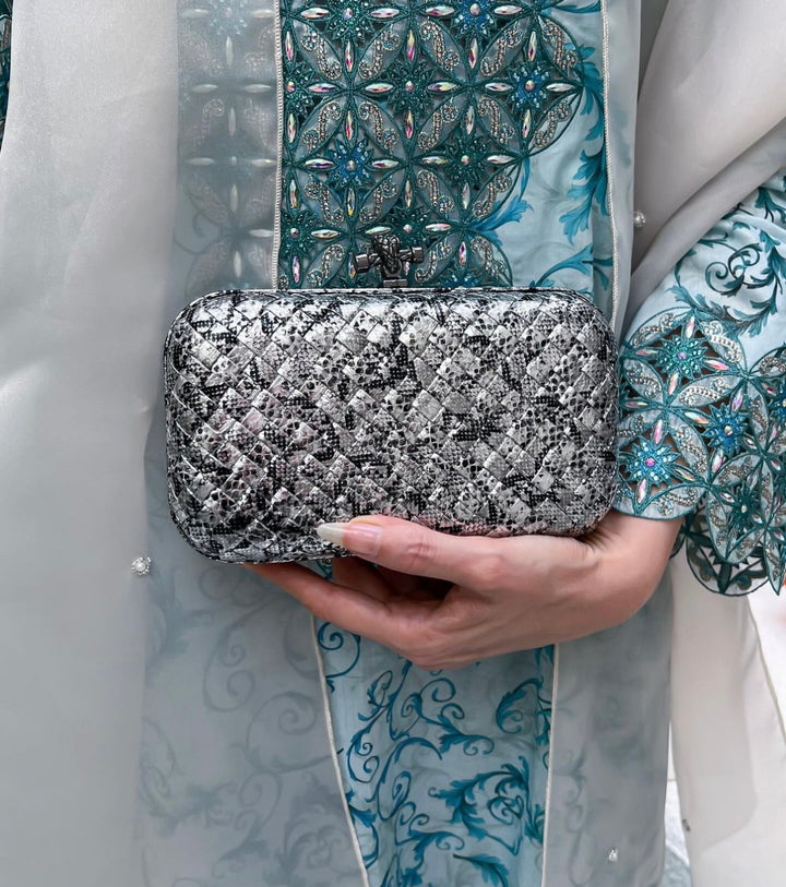 Limited  silver clutch