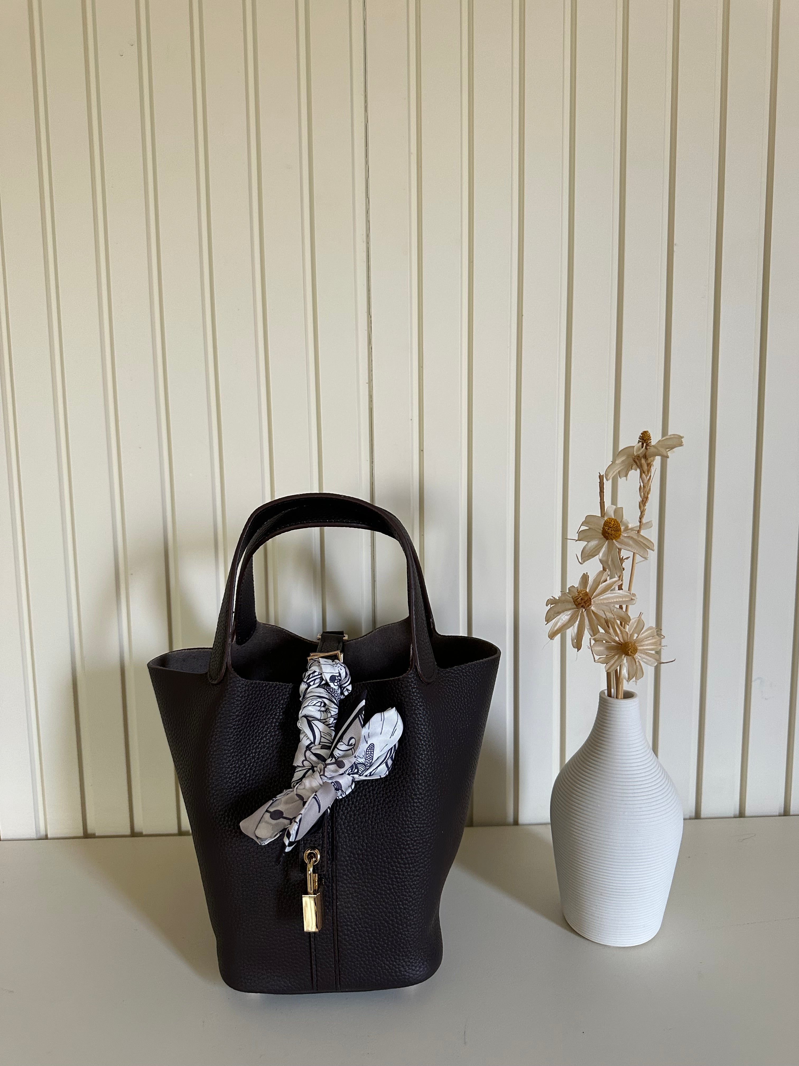 Clear UAE burgundy P bag front view
