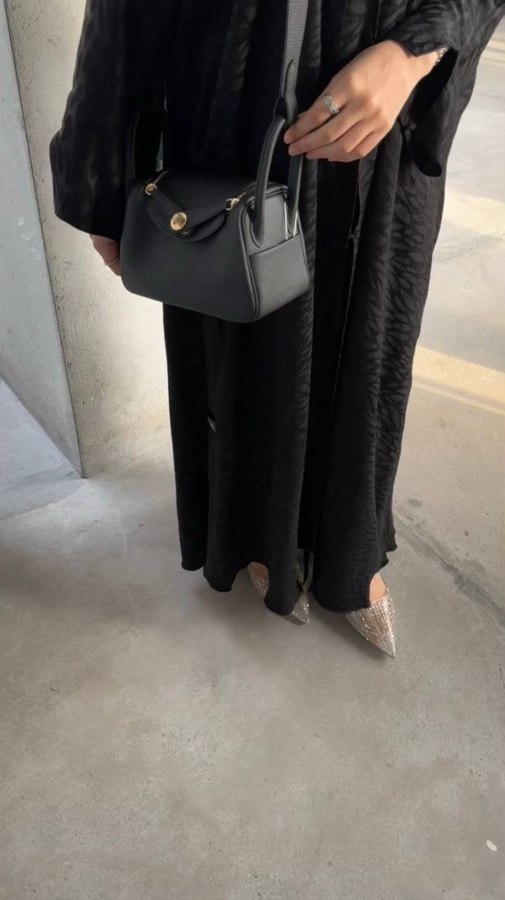 Clear UAE black Lindy shoulder bag detail view

