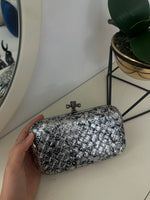 Limited  silver clutch