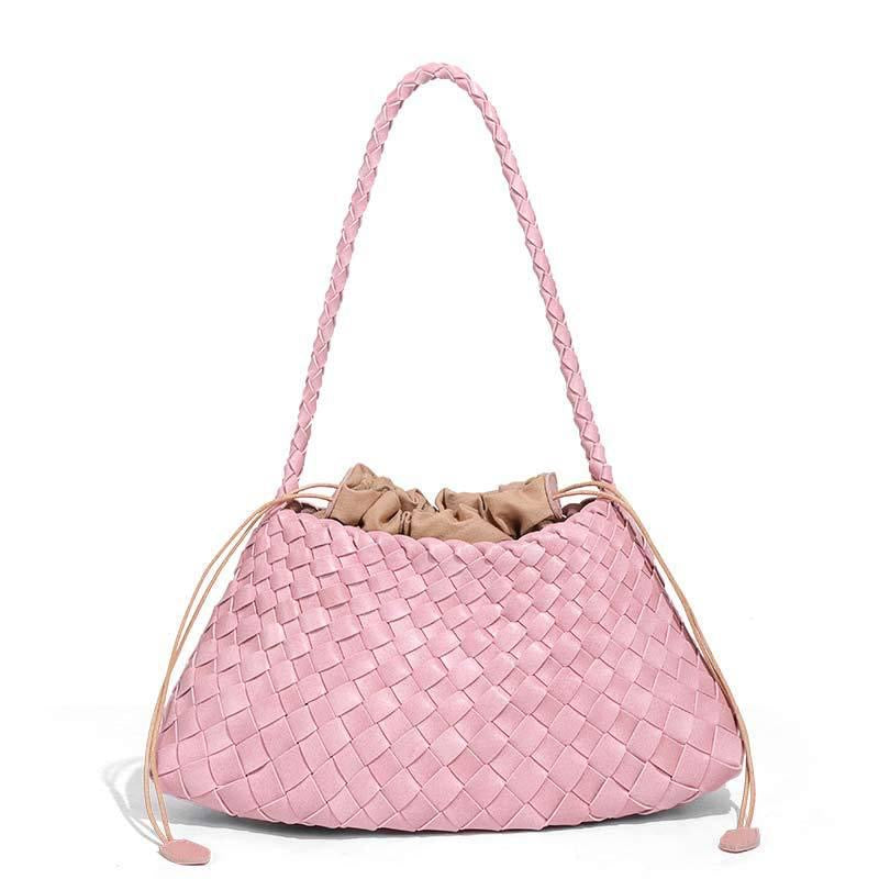 Pink woven handbag with a drawstring on a white background