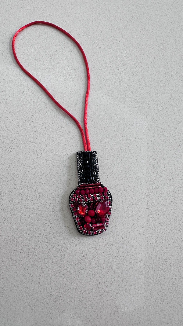 Nail polish charm