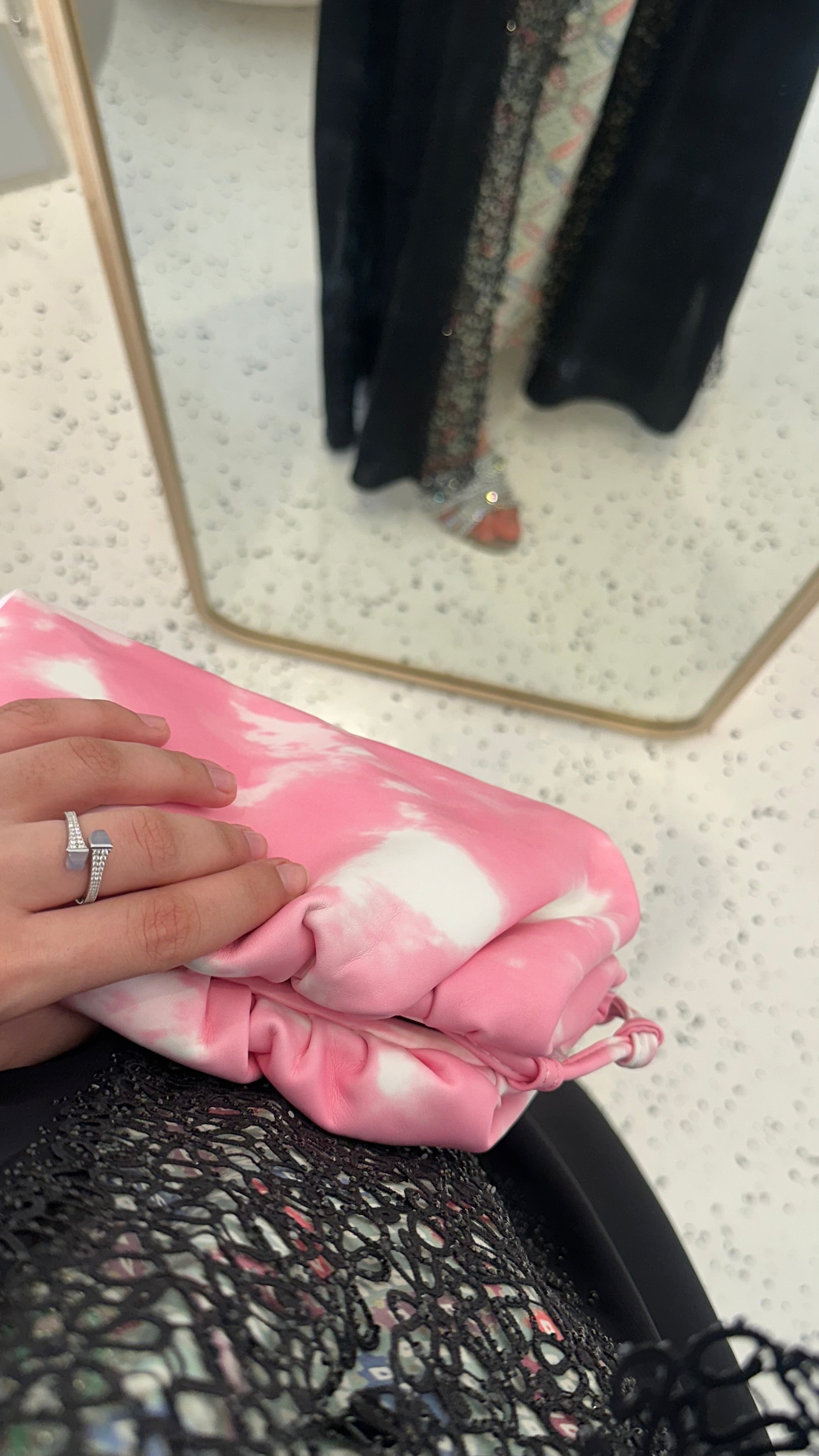 Clear UAE mix pink Bottega pouch bag detail view
