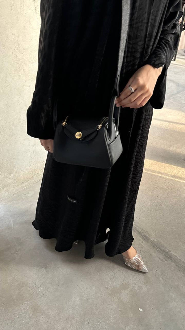 Clear UAE black Lindy shoulder bag detail view
