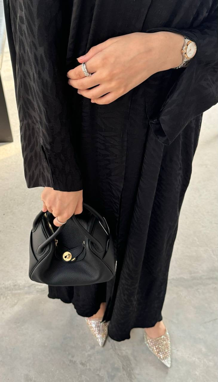 Clear UAE black Lindy shoulder bag detail view
