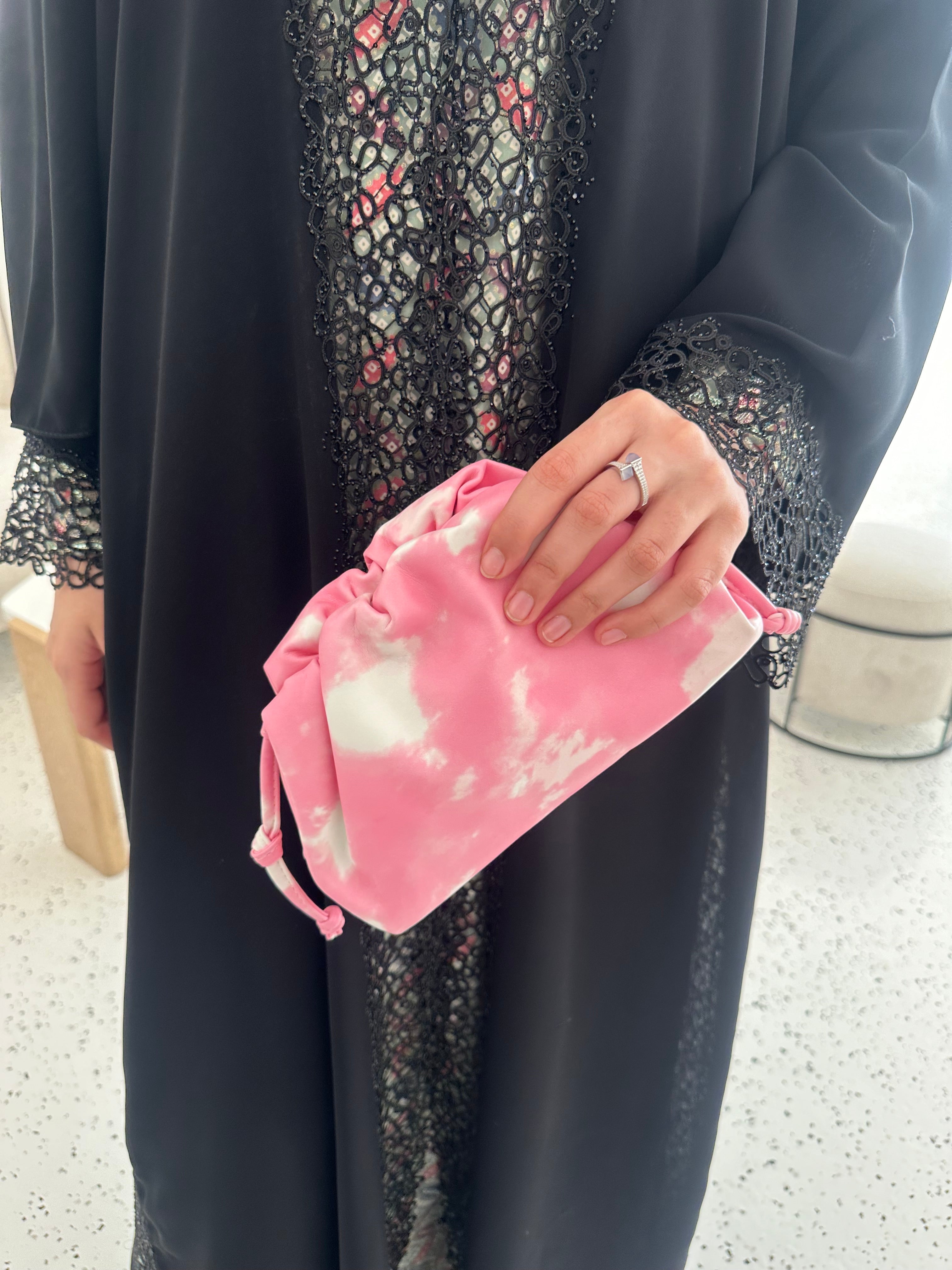 Clear UAE mix pink Bottega pouch bag detail view
