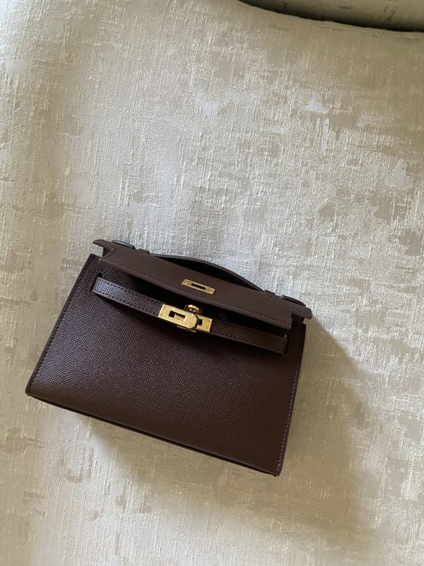 Burgundy Kelly Cut clutch bag front view by Clear UAE