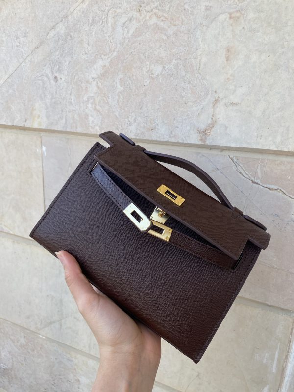 Burgundy Kelly Cut clutch bag front view by Clear UAE