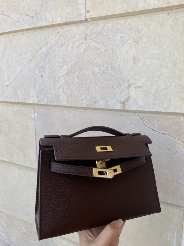 Burgundy Kelly Cut clutch bag front view by Clear UAE