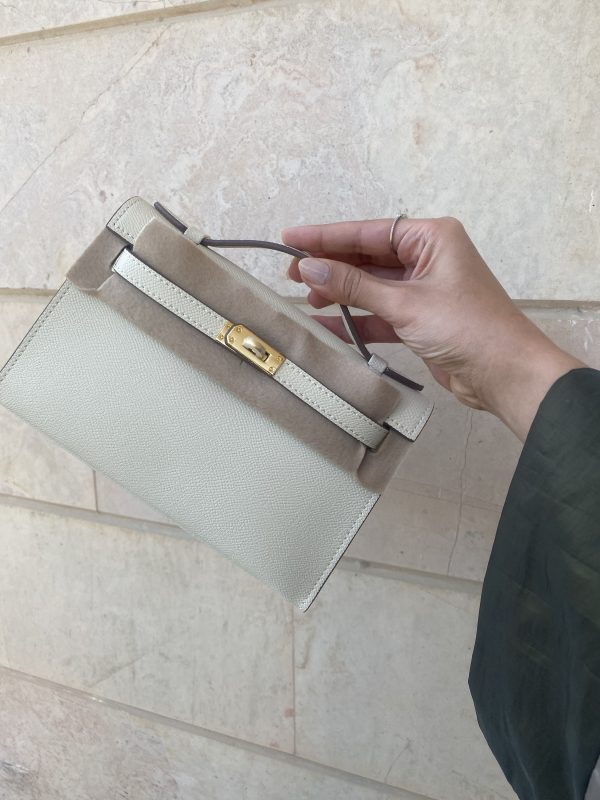 Hermes Kelly Cut Clutch off white – Clear UAE