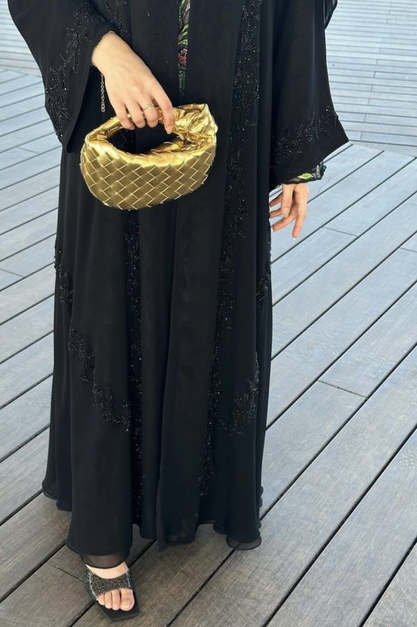Gold micro handle bag by Clear UAE