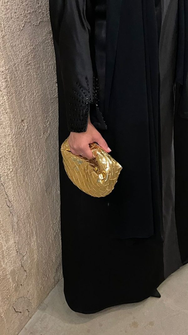 Gold micro handle bag by Clear UAE