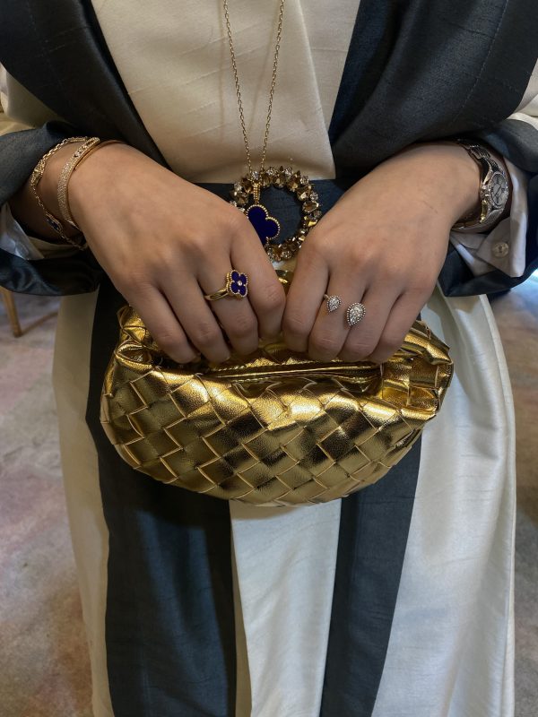 Gold micro handle bag by Clear UAE