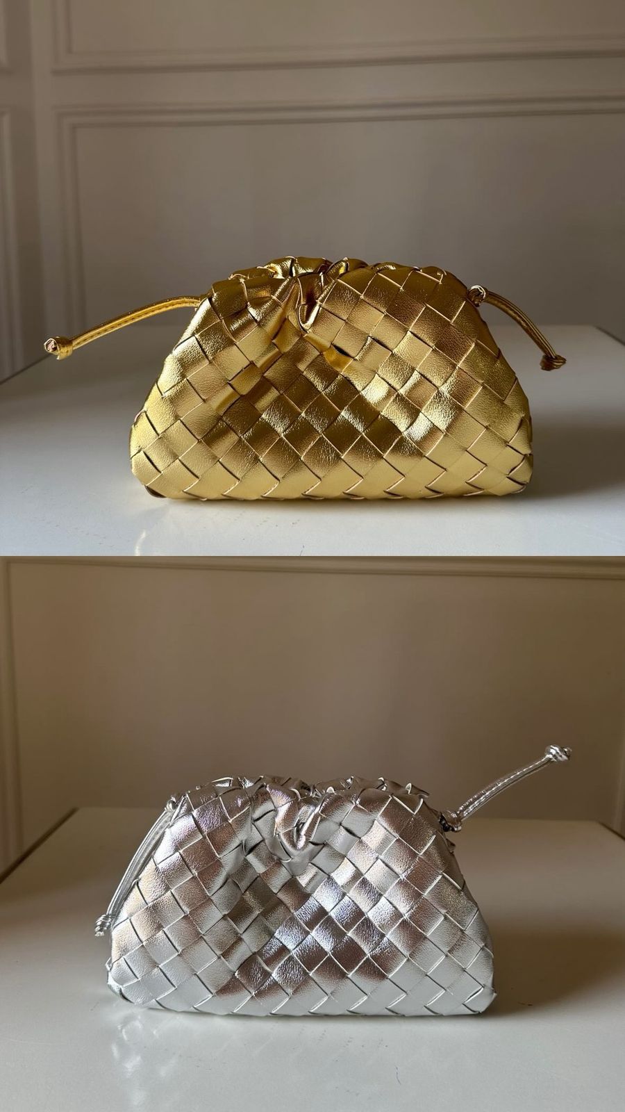 Two woven handbags, one gold and one silver, on a white surface with a neutral background.