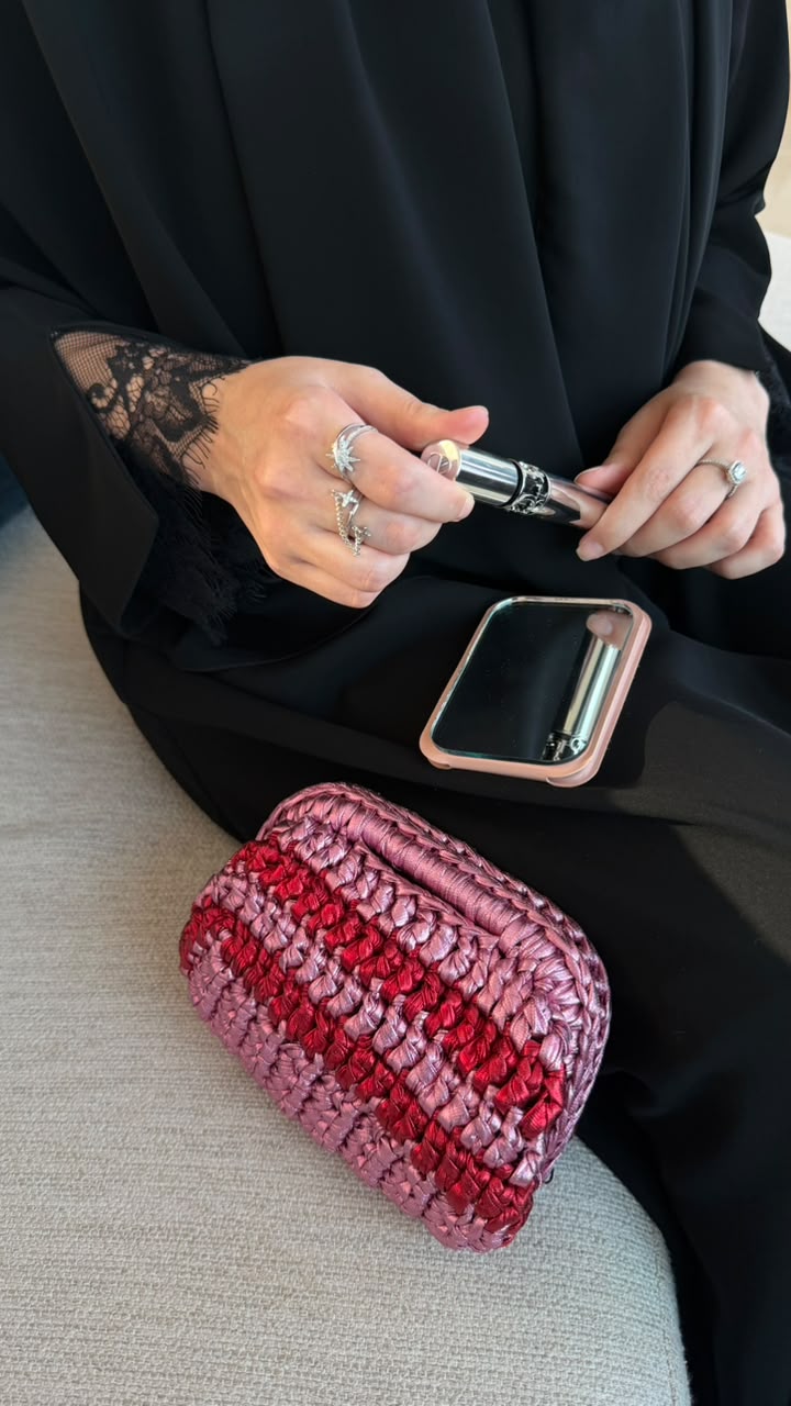 Mix Pink Red Bag on sofa close up
