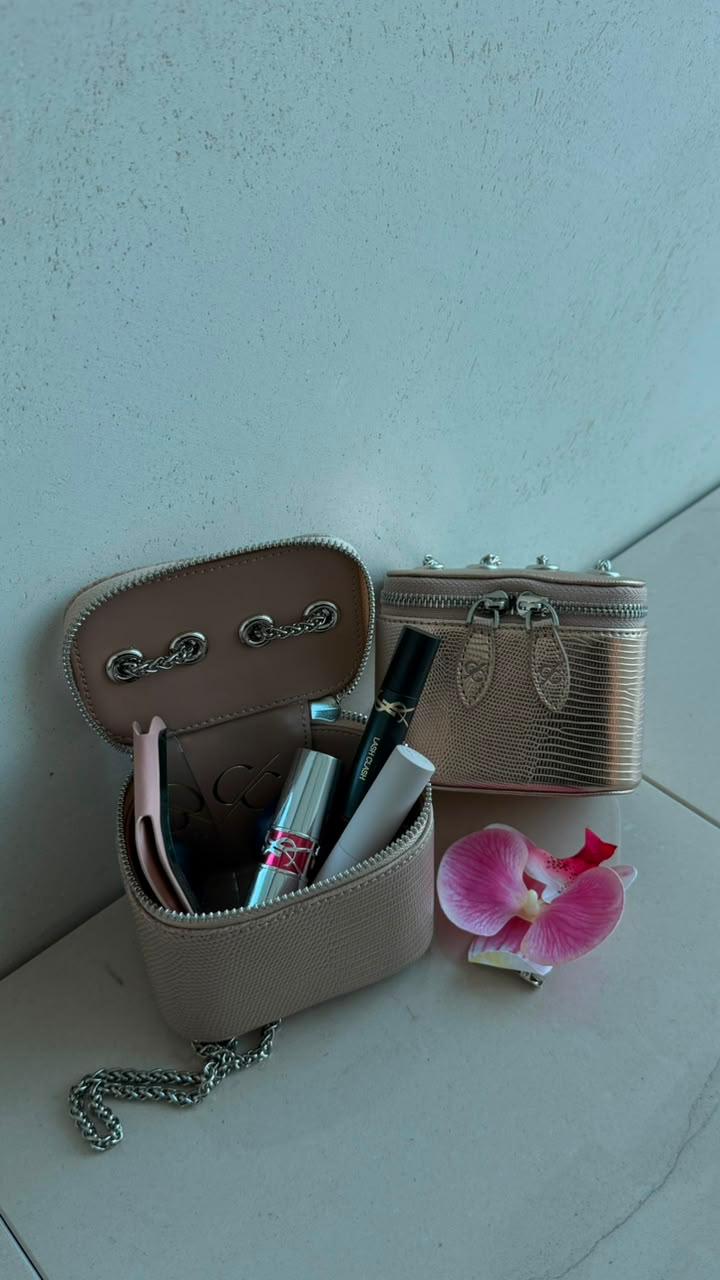 Mini Vanity Chain Bag nude open showing interior with makeup and pink orchid flower