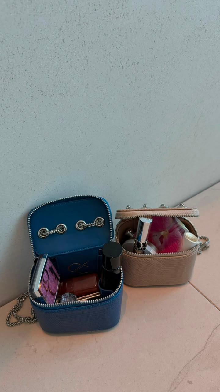 Mini Vanity Chain Bags in blue and nude open showing interior with makeup items