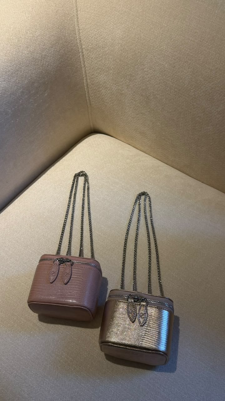 Mini Vanity Chain Bag Gold - angle view on sofa