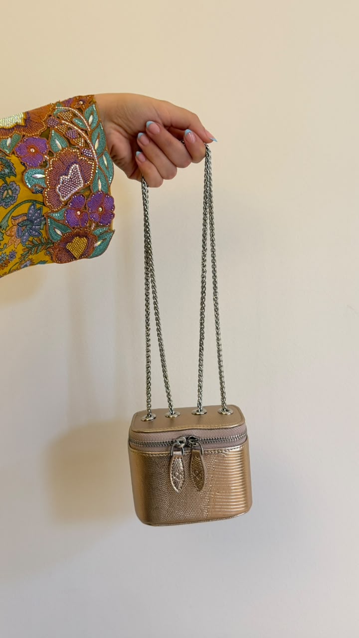 Mini Vanity Chain Bag Rose - angle view on sofa