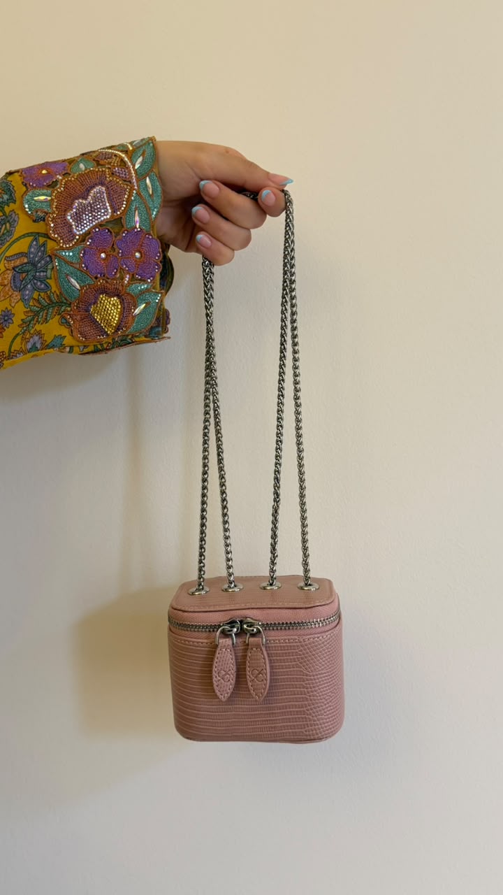 Mini Vanity Chain Bag Rose - side view on sofa