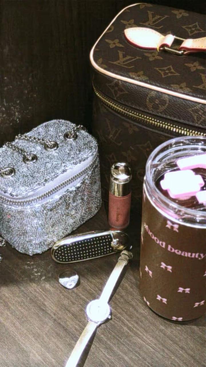 Silver sequin vanity mini bag flat lay with luxury accessories
